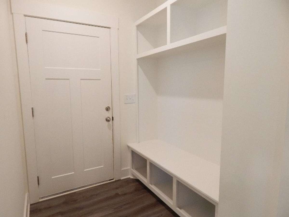 Inside the garage door is this perfect place for storage of coats, shoes...whatever!
