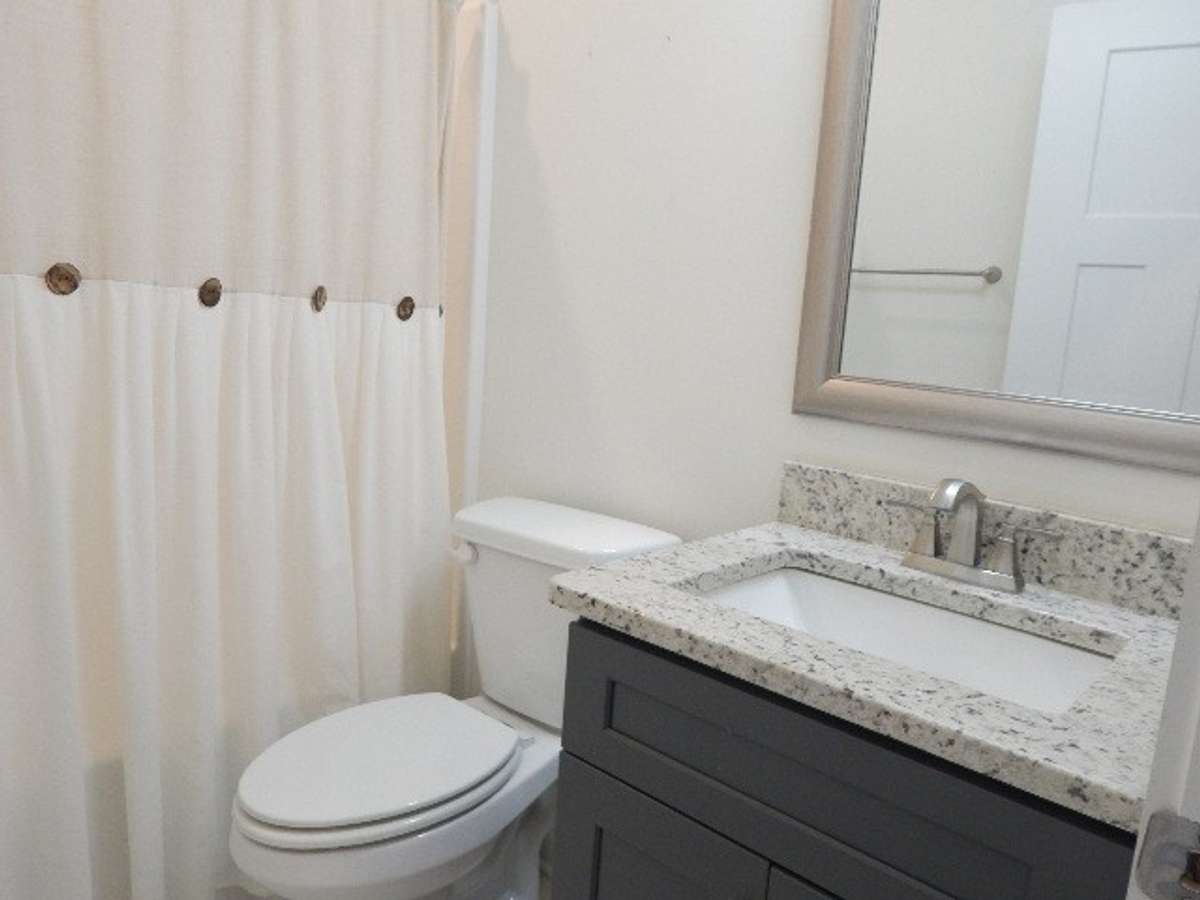 Full bath with shower/tub unit for the other 2 bedrooms