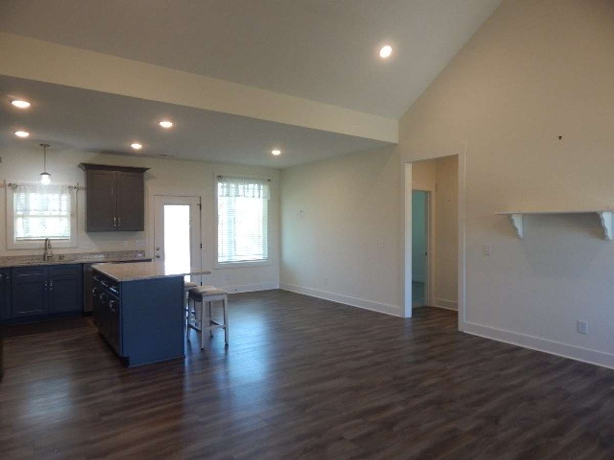 The door at the dining area goes out onto a covered back porch area.