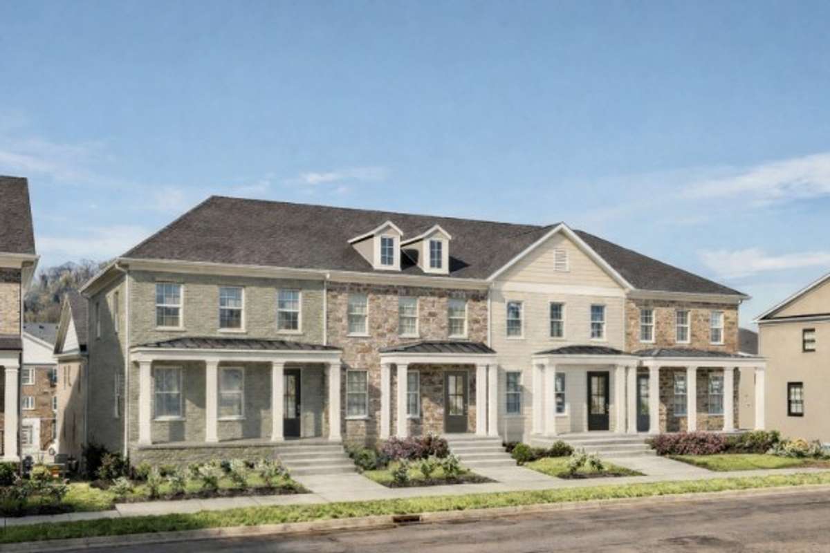 Charming brick exteriors with covered front porches. (artist rendering)