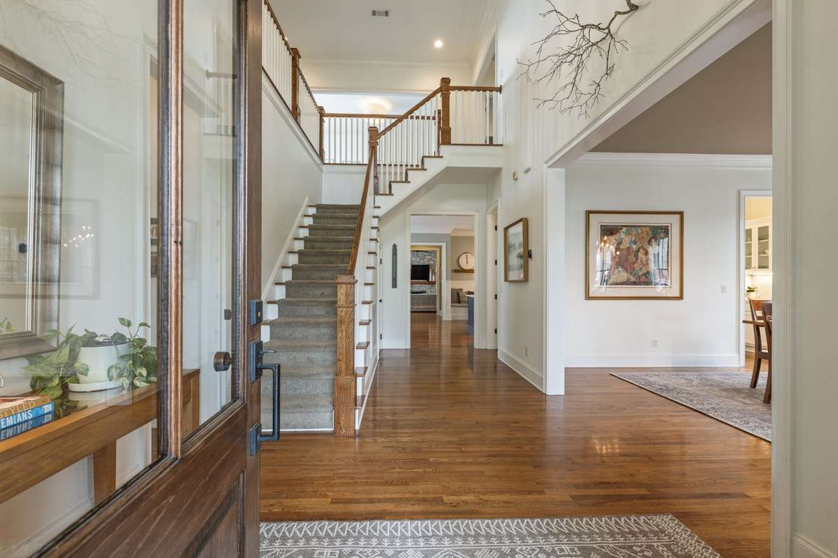 2 Story foyer welcomes you into this light-filled home