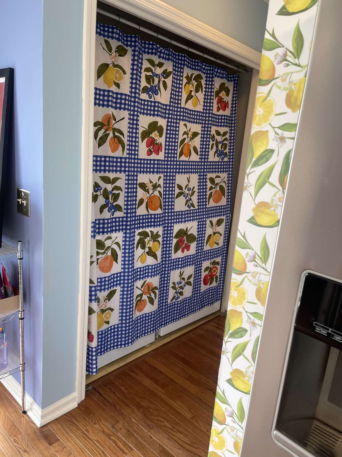 This is the laundry room covered by a cheery curtain..  Washer and drye are negotiable.