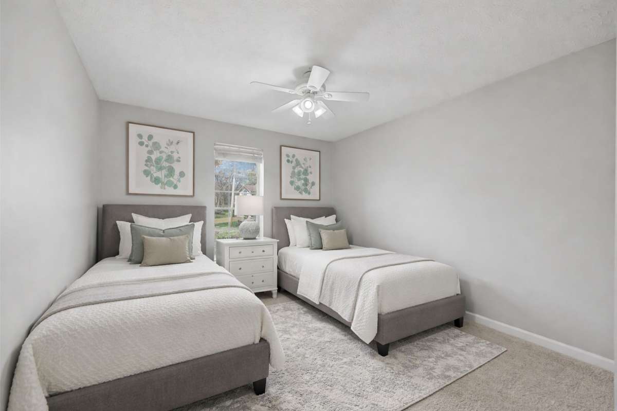 Bedroom 2 has carpet and a large closet.