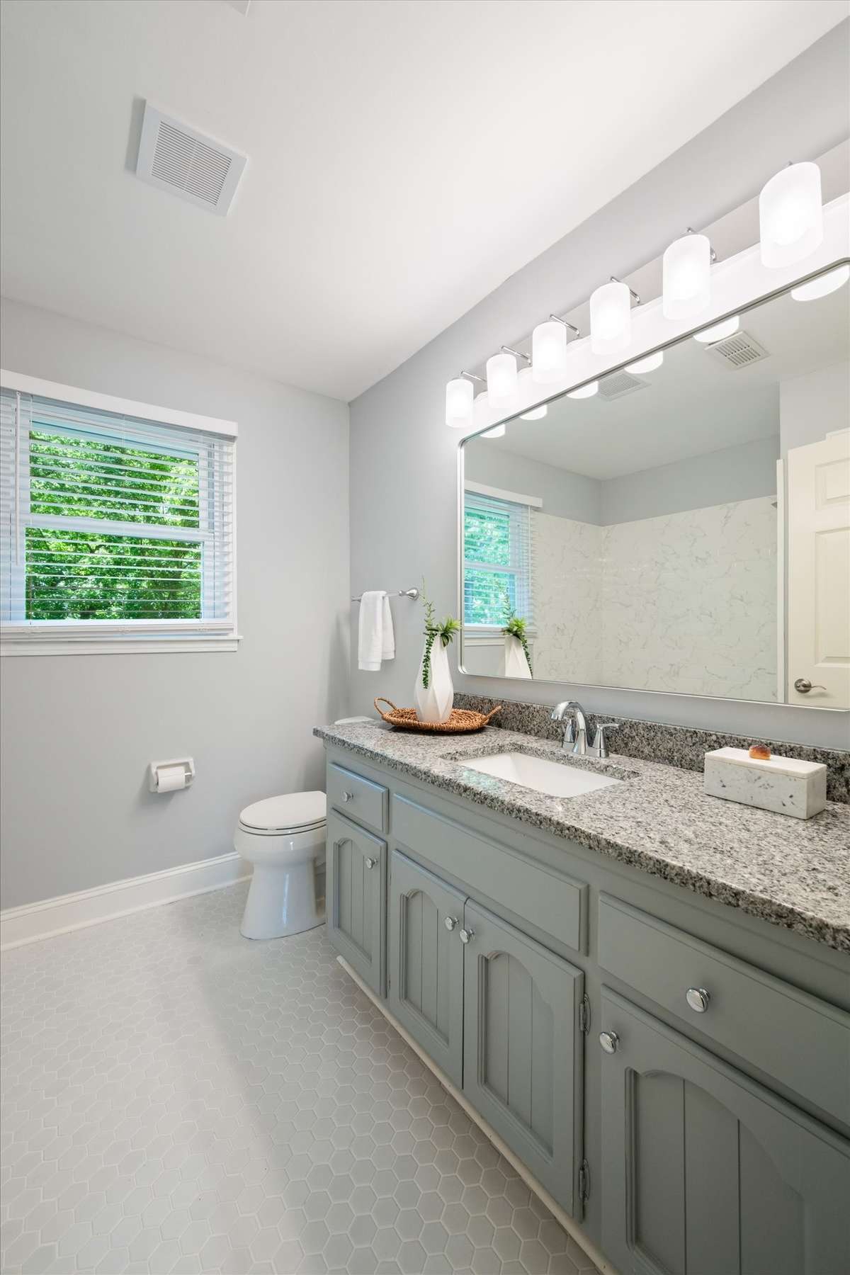 Full bathroom shared by the secondary bedrooms. Everything has been updated here.