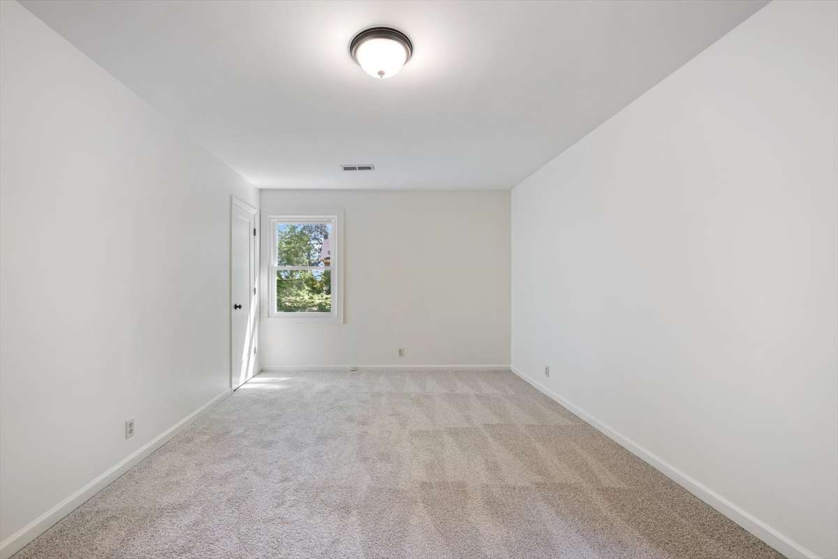 Secondary bedroom, very large and faces the rear.