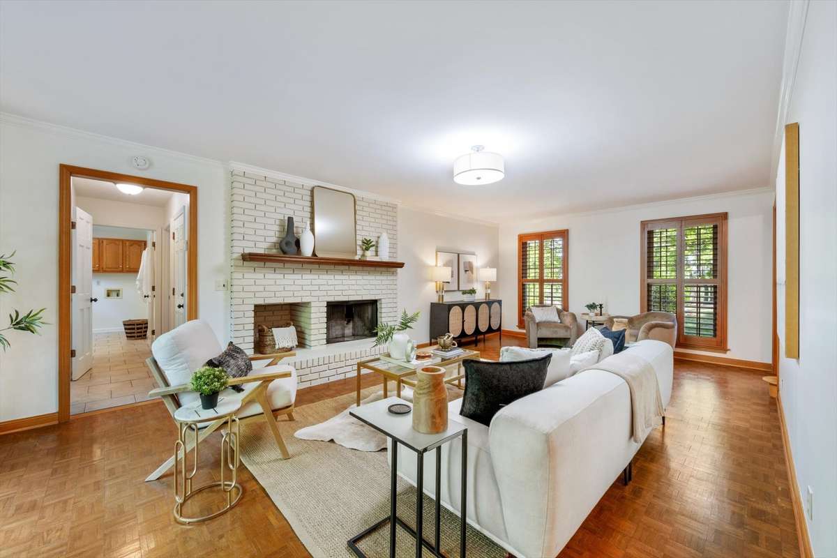 Plantation shutters and wood trim add warmth to this room.
