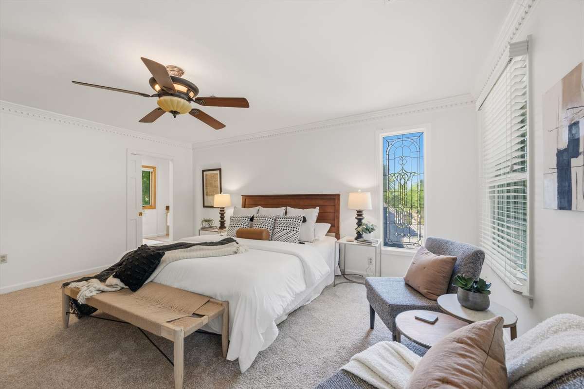 Gorgeous added touch of the etched glass window by the bed.