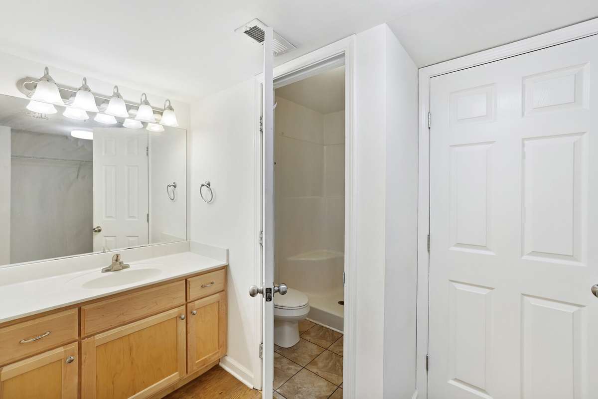 Primary Bathroom, plenty of room to get ready and it has a private toilet room