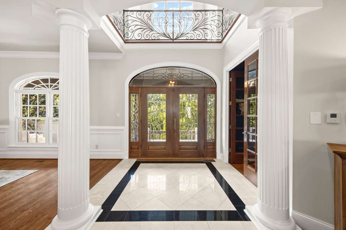 Double front doors into the Grand Foyer.