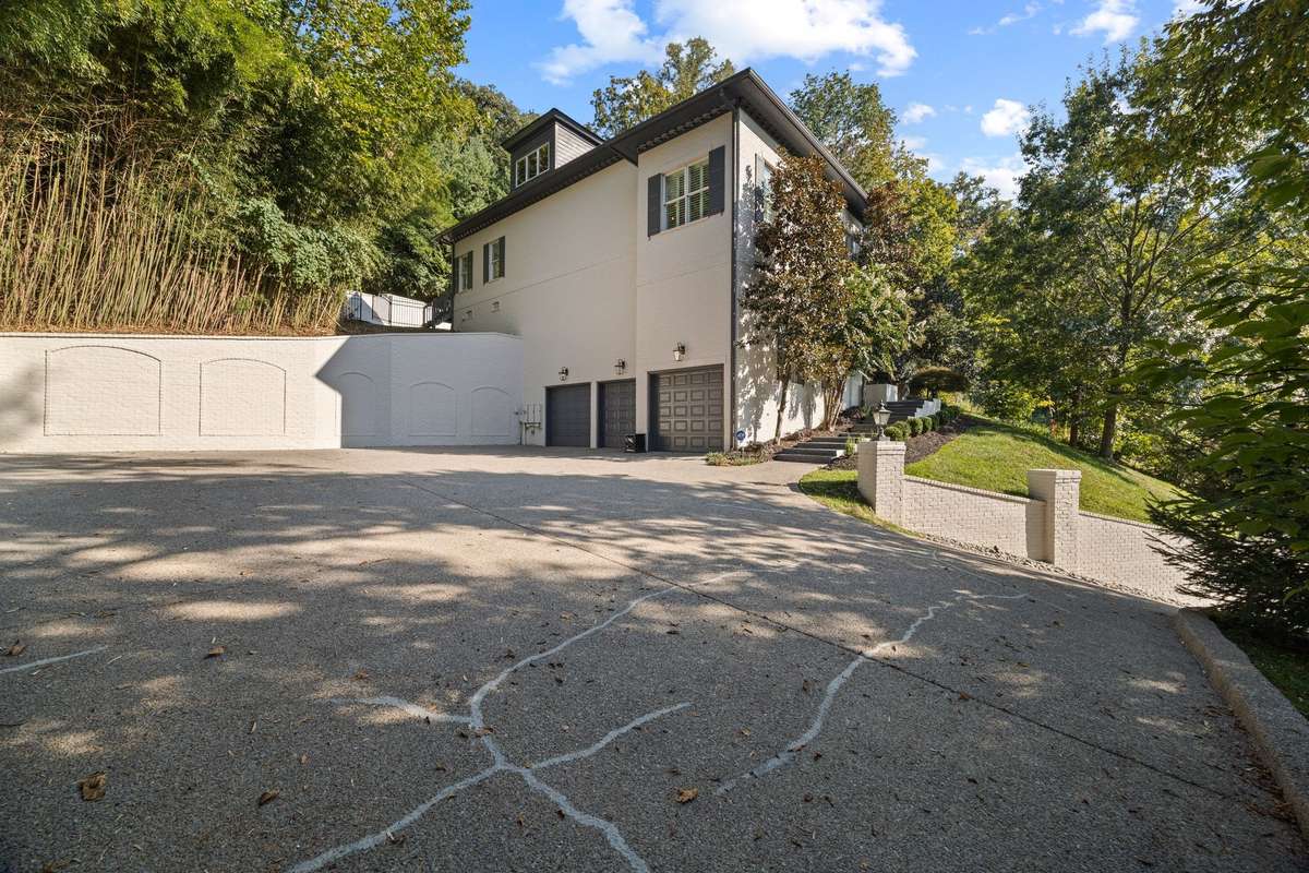 3 car garage with additional space to park several cars or an RV, boat, motorcycles whatever.