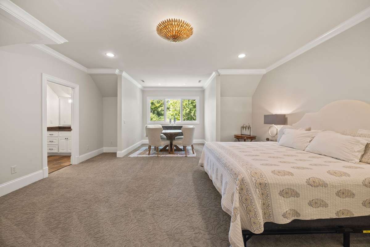Second Primary Upstairs Bedroom with ensuite bathroom and large walkin closet.
