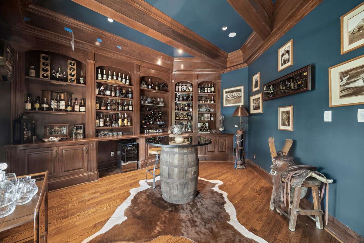 Currently a Bourbon/Whiskey Room, this amazing space could easily be your home office/library with great views of the rolling hills of Nashville.