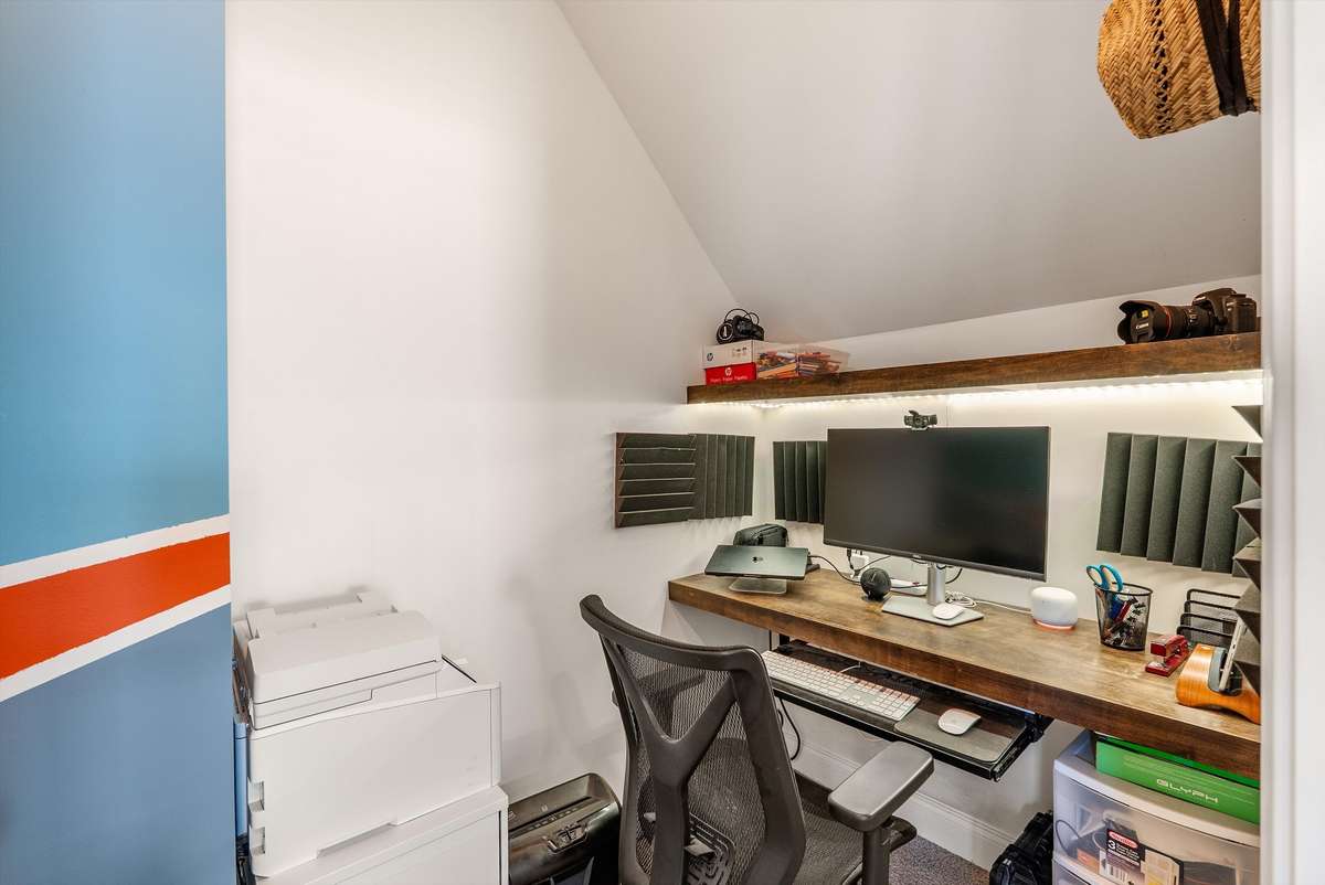 Owners added built-in shelves to create a private office inside the bonus room