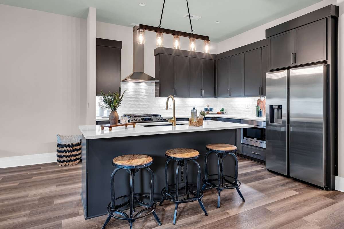 Kitchen with Beautiful Open Area and Eat In Bar Area.