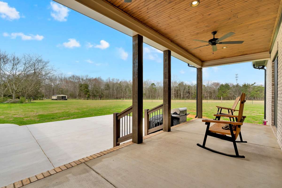 Gorgeous back porch with wood accent