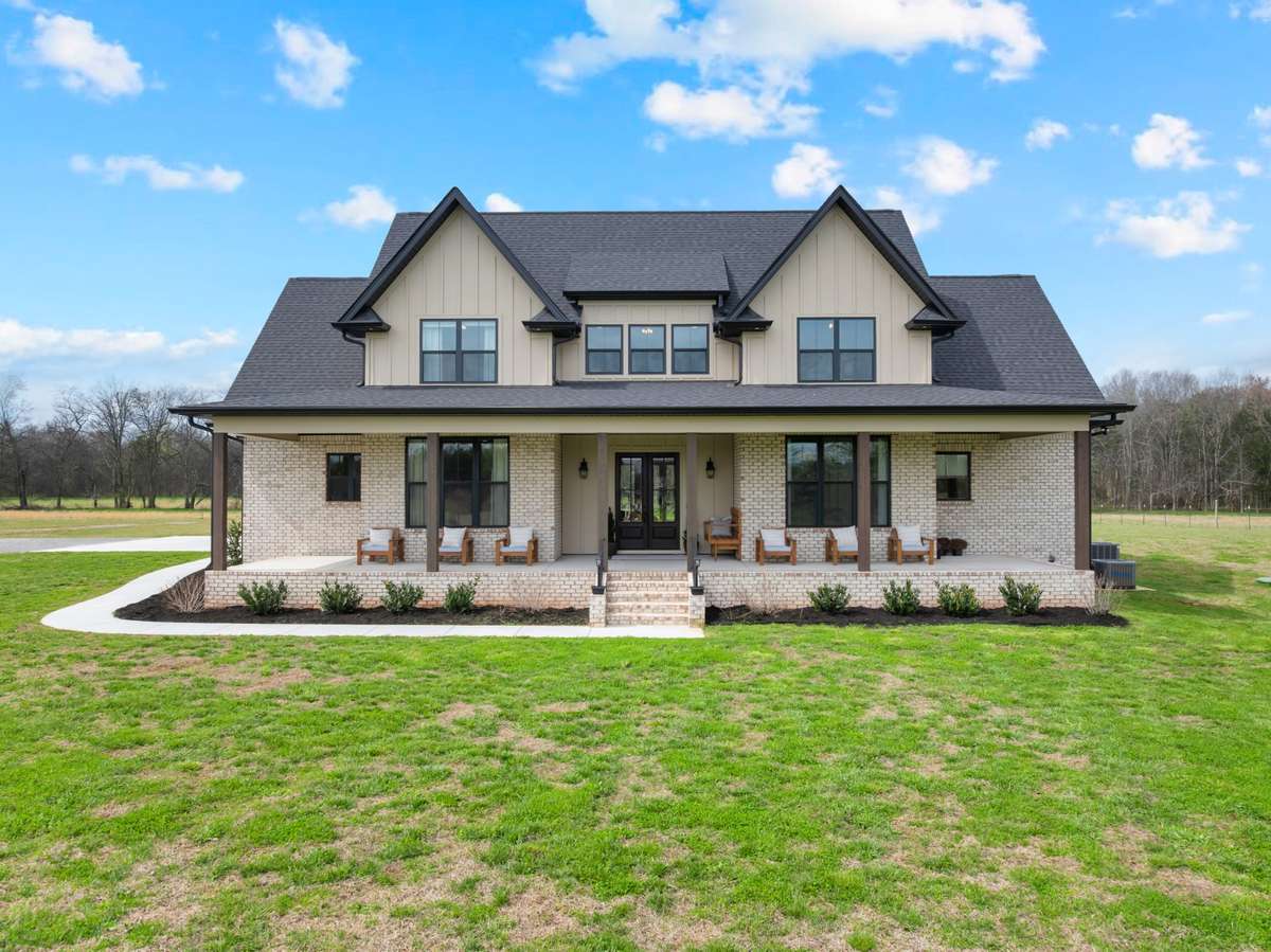 8643 Midland Road, Bell Buckle, TN
Minutes from Murfreesboro
Custom farmhouse with 5 bedrooms, 4 baths, study, and loft with a 3-car garage on 4 acres
