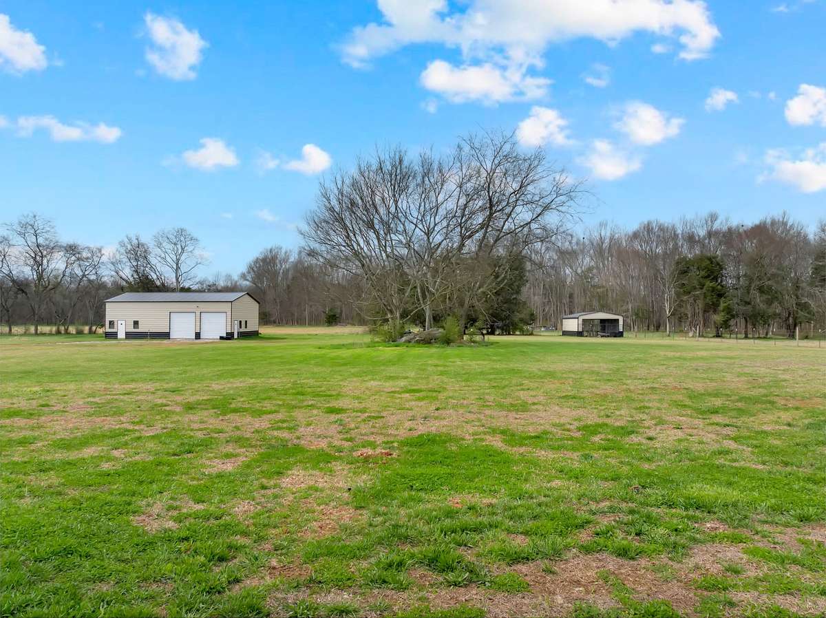 Beautiful acreage and a large shop, 30 x 50, with a car lift
Carport also for extra storage