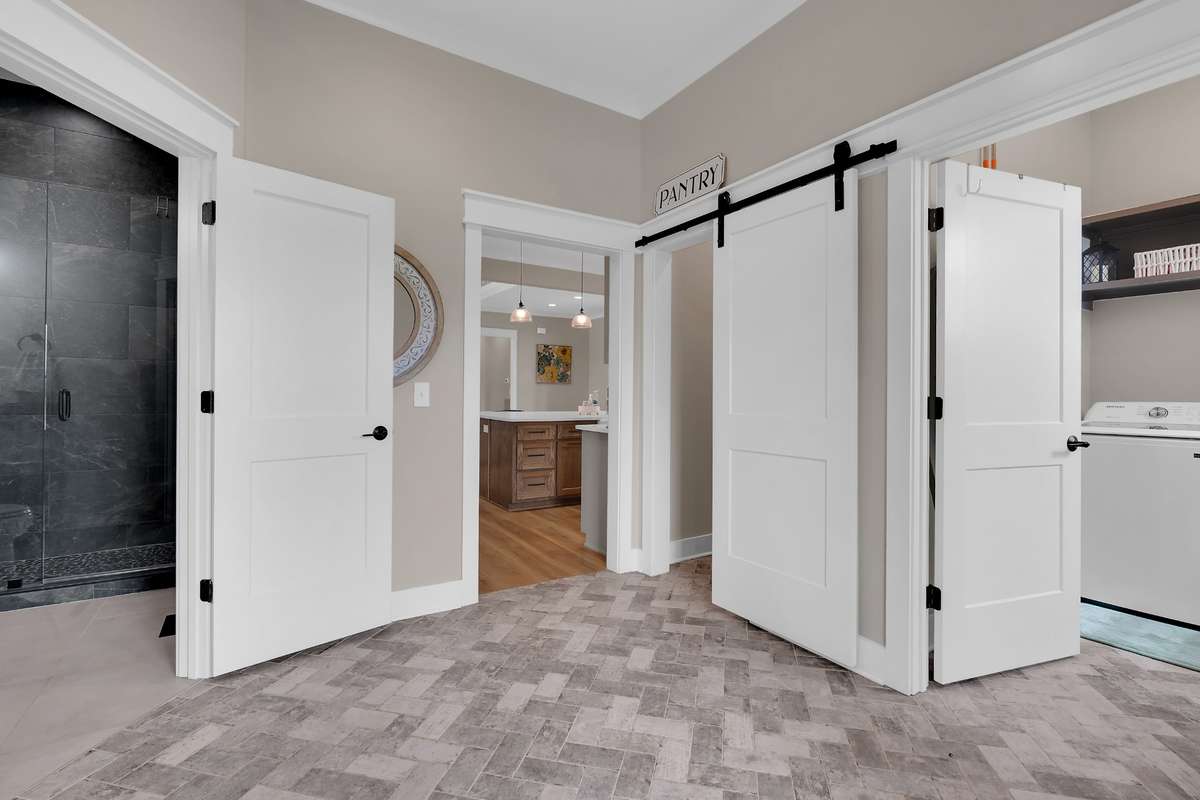 Full Bath off the mudroom with walk in tile shower