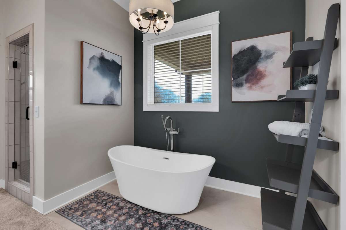 Soaking tub with accent wall in Primary Bath