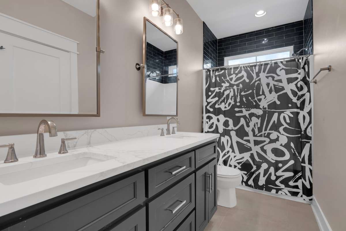 Second full bath on the second floor.  This is tub/shower combo and double vanities
