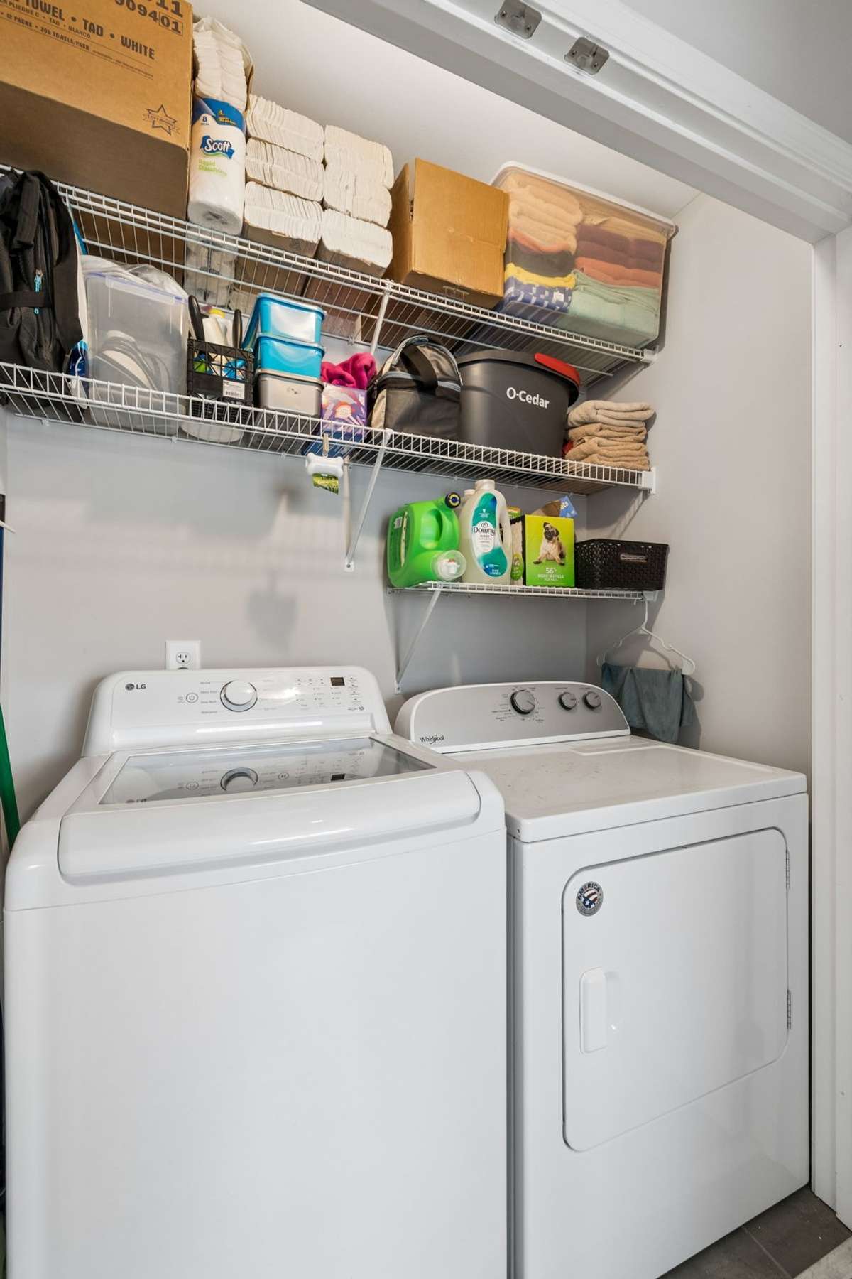 Laundry Closet with Additional Storage Shelving.