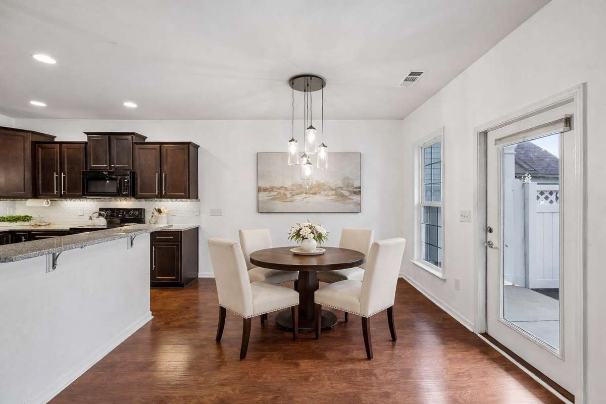 This Dining Area has been digitally staged with furniture.