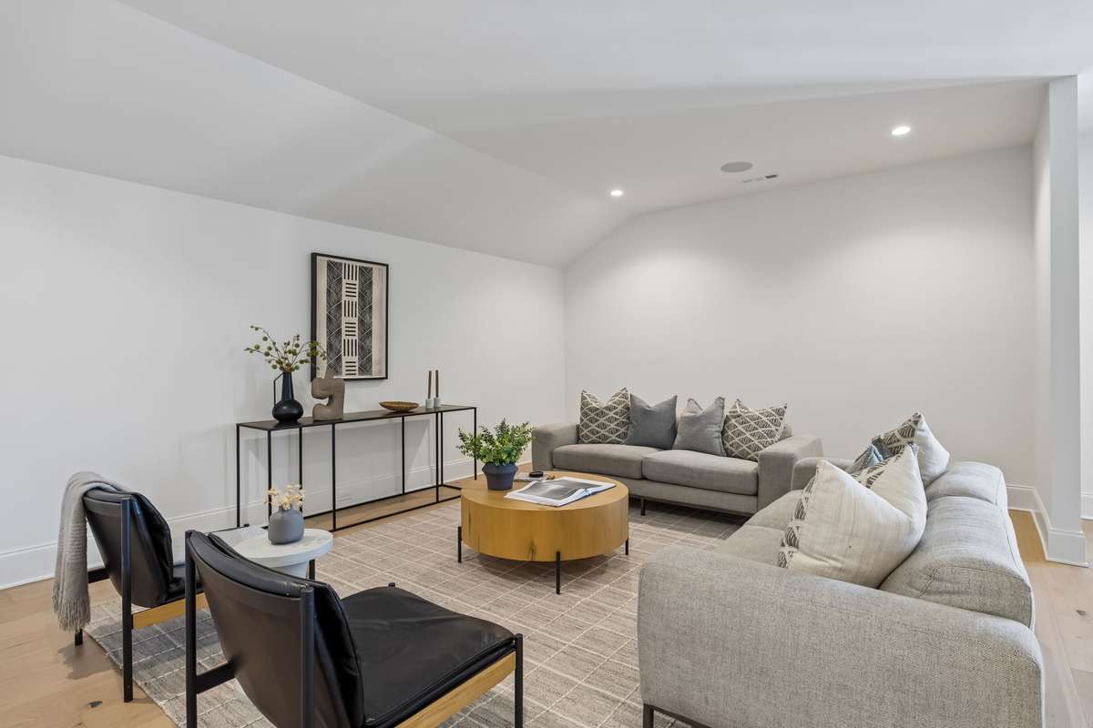 Bonus Room Two offers a spacious and versatile layout, perfect for a media lounge, game room, or additional living area. Thoughtfully designed with ample room for multiple seating arrangements, this space provides flexibility for every option