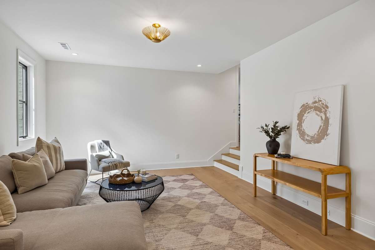 One of three versatile bonus spaces, this light-filled room offers the perfect setting for a media lounge, playroom, or home office. Thoughtfully designed with a comfortable layout and natural light, it provides flexible living to fit a variety of ne