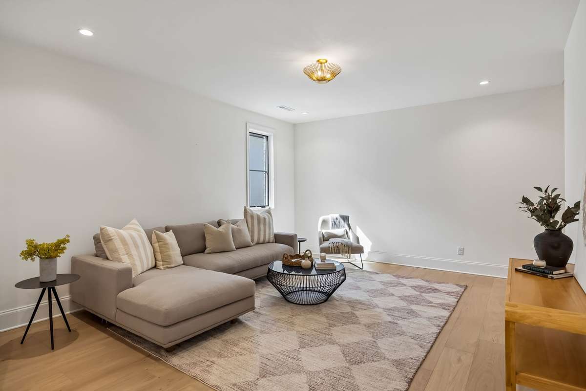 One of three versatile bonus spaces, this light-filled room offers the perfect setting for a media lounge, playroom, or home office. Thoughtfully designed with a comfortable layout and natural light, it provides flexible living to fit a variety of ne