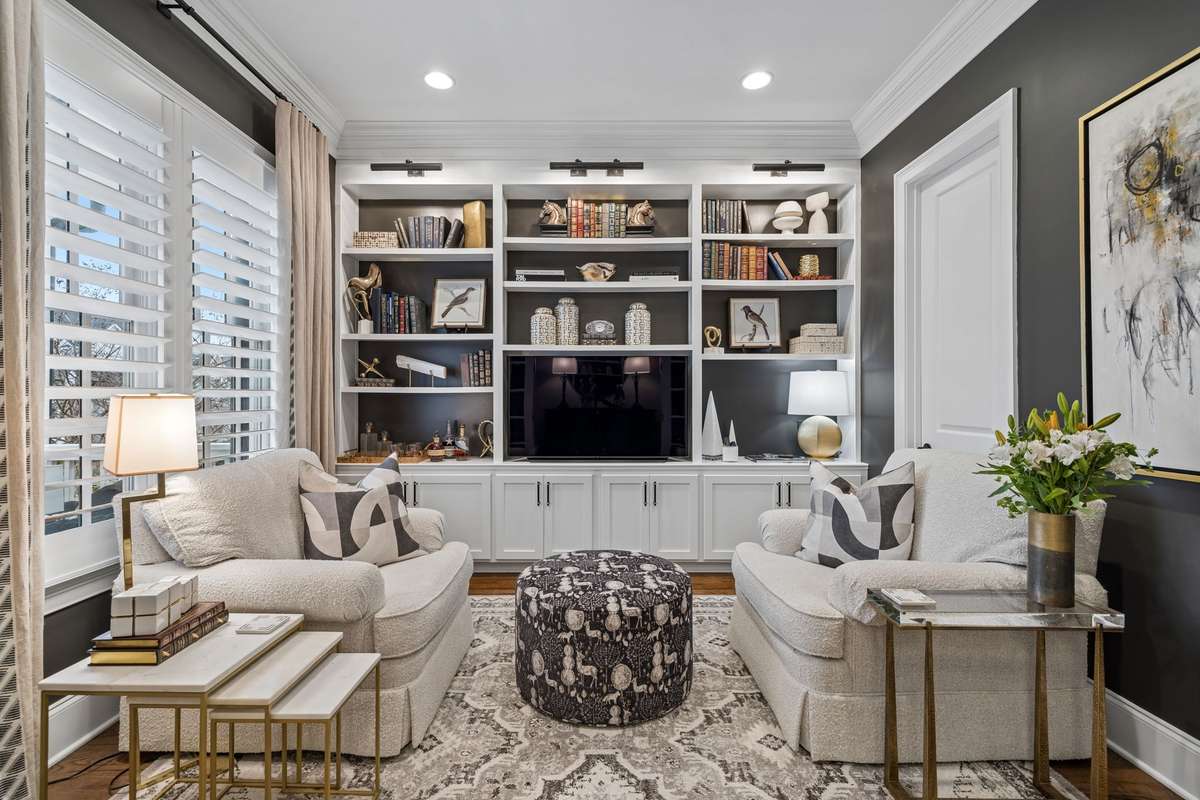 Office/Library with Custom Built-in Cabinets and Walk-In Coset.