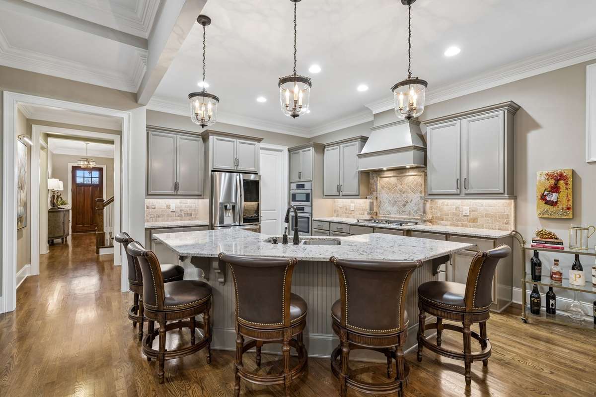 Oversized kitchen island with extra seating and room for serving.