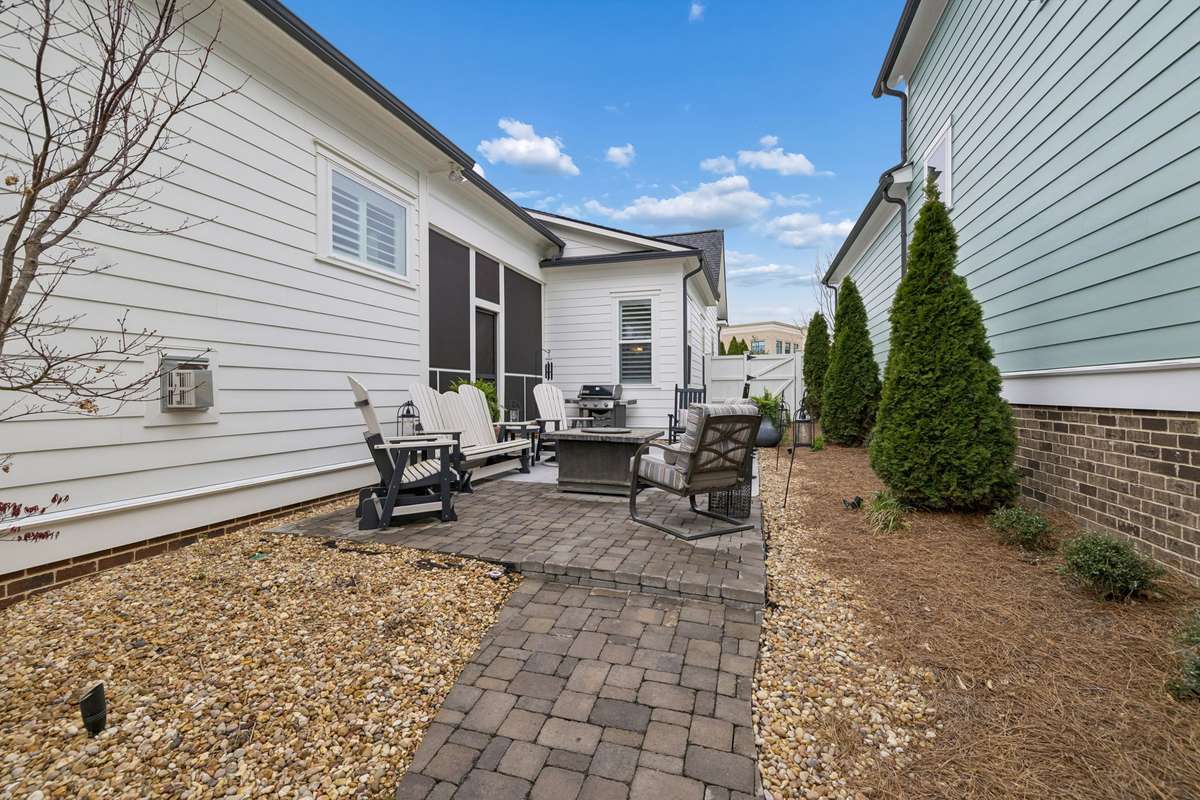 Fenced side yard.