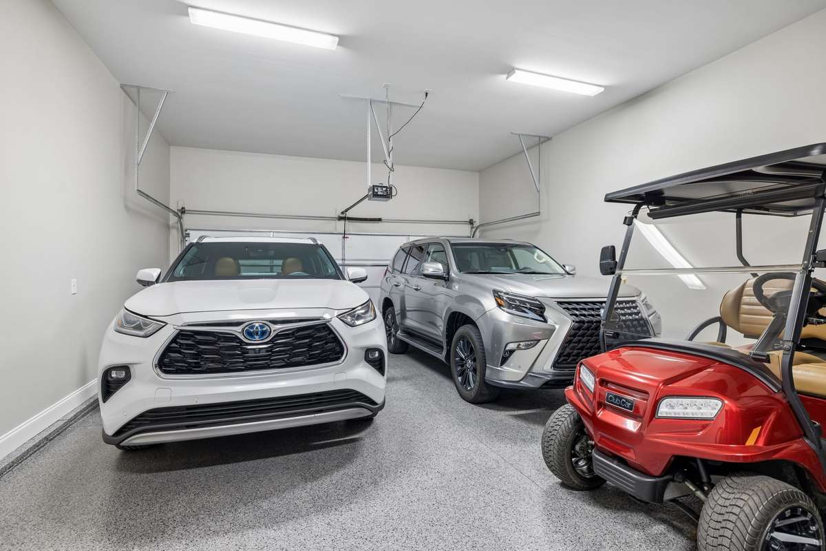 Oversized two car garage with Epoxy coated flooring.