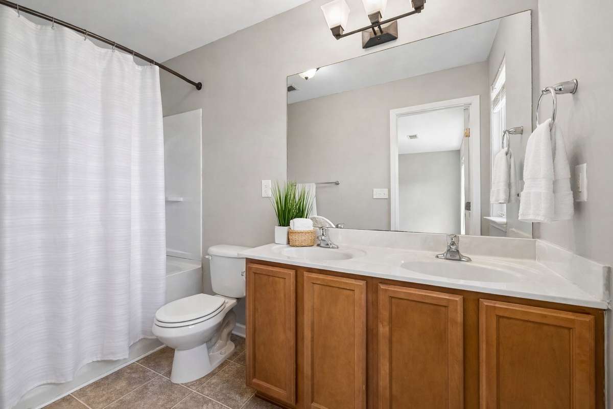 Some images may include virtual staging or minor AI enhancements for illustrative purposes. Furnishings and landscaping shown may not represent the current condition of the property.
