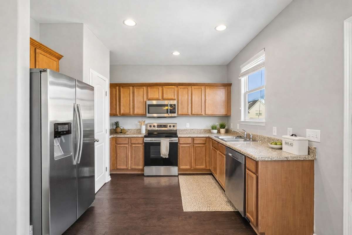 Some images may include virtual staging or minor AI enhancements for illustrative purposes. Furnishings and landscaping shown may not represent the current condition of the property.