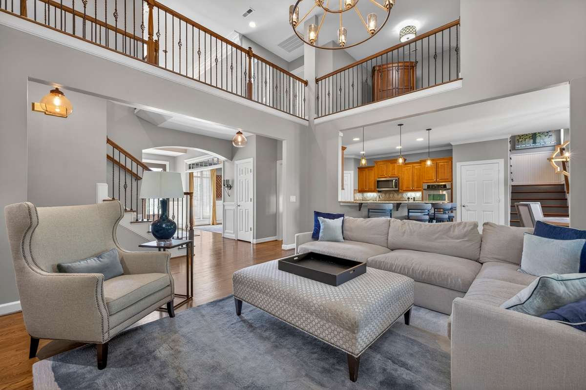 Overhead railings provide a view of the downstairs.