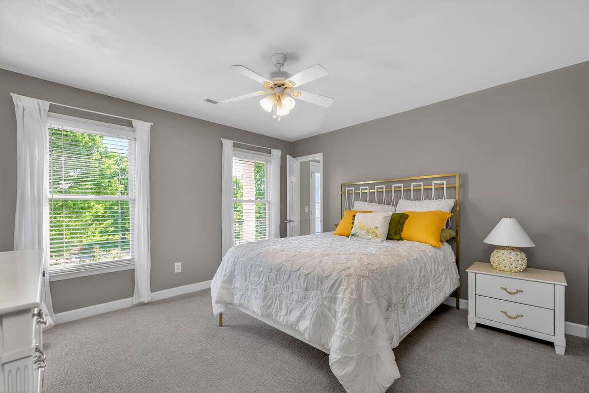 Bedroom two is spacious and connects to bedroom three by a jack-and-jill bathroom.