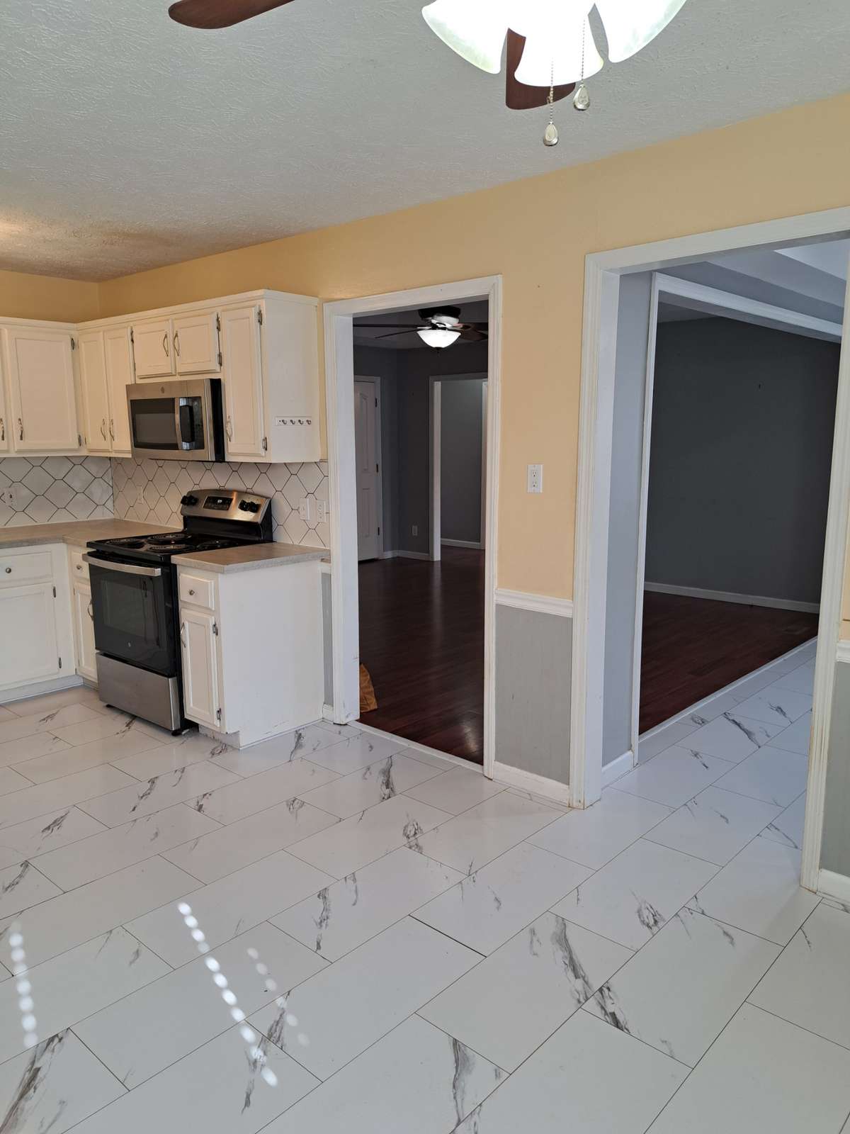 Looking into Kitchen, Living room and Dining room.