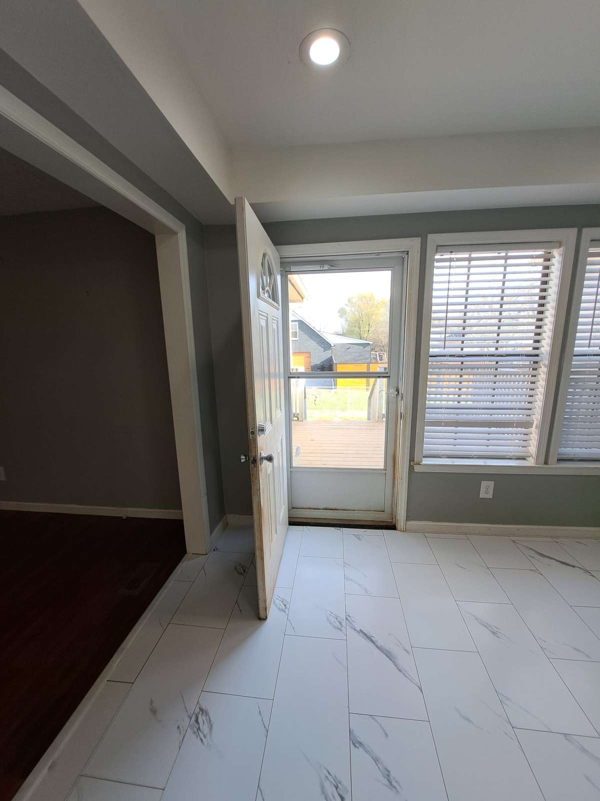 This door leads to the deck and side yard.