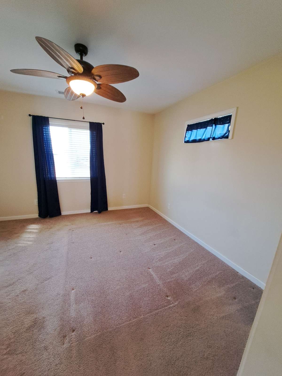 Curtains can stay if Buyers want them.