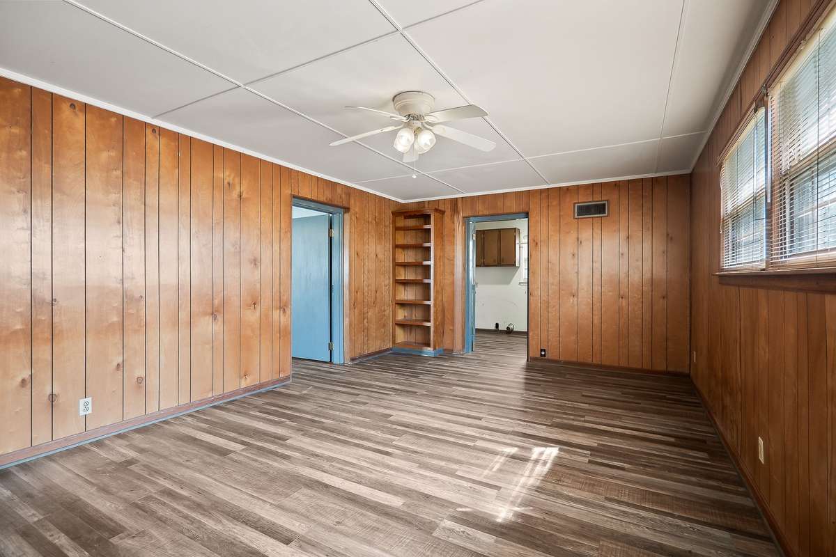 Den is conveniently located off of the carport