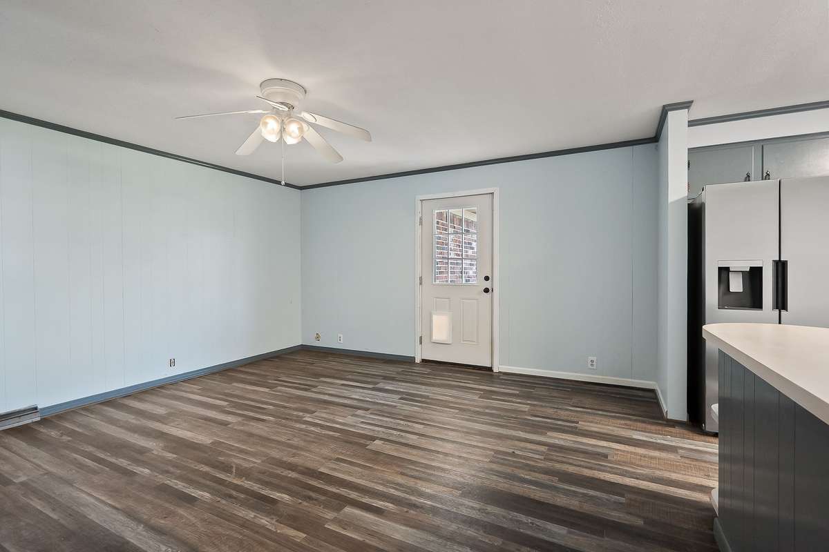 Huge eat in kitchen that opens to fenced in backyard