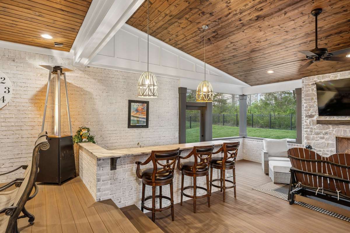 Serving food and drinks is easy with the built-in bar.