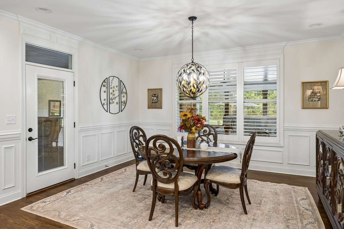 Enjoy easy access to the covered porch right off the kitchen.