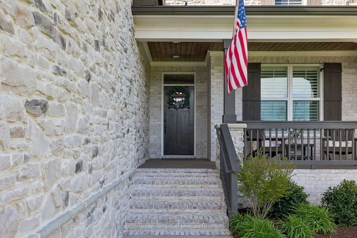 The brick and stone create an appealing exterior.