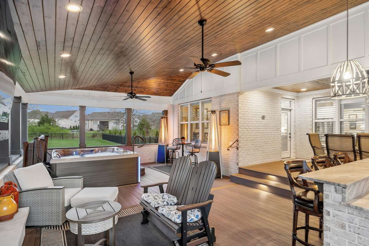 The wood paneled ceilings and lights create a warm, inviting place to enjoy in every season.
