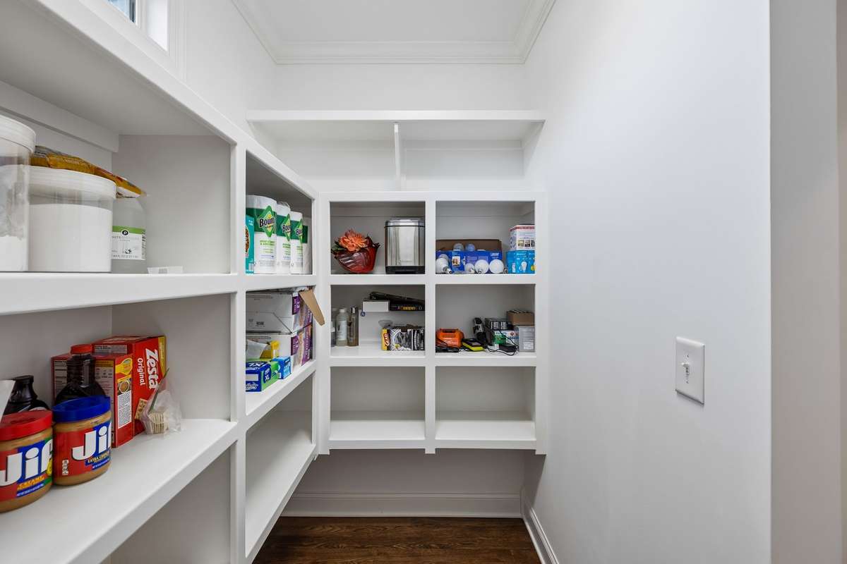 A spacious walk-in pantry for additional storage.
