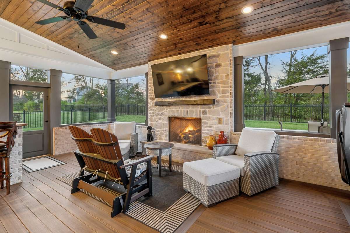 The outdoor covered/screen porch is the perfect place to entertain.