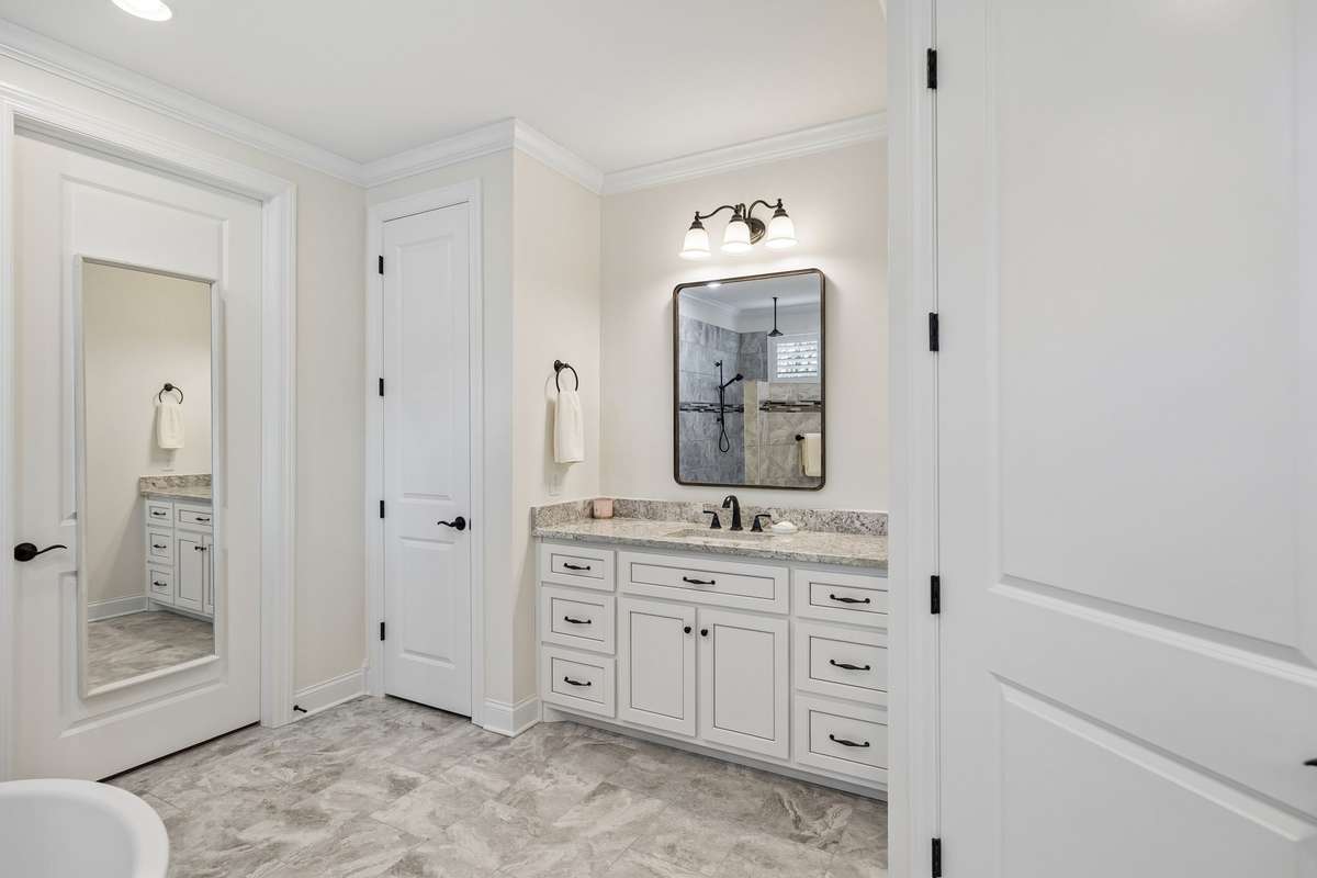 Enjoy the convenience of two separate vanities with ample cabinet storage in each.
