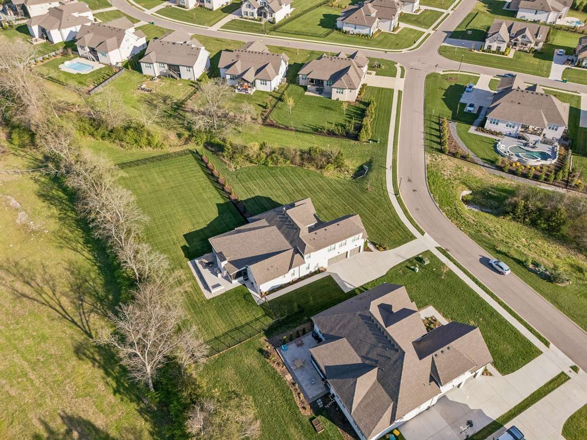 The home is tucked away on a quiet street in The Cove at Spring Hill community.